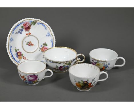 Three 18th century Dutch porcelain small tea cups, The Hague factory - one finely-painted with squash, carrots, walnut and fl