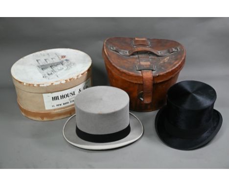 A vintage black silk top hat by Morgan of Dublin in fitted leather hatbox by R Erskine to/w a grey felt top hat by A J White 