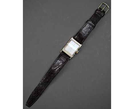 A vintage Longines gold plated wristwatch, the 17 jewel movement No. 6922197, with textured lizard strap  