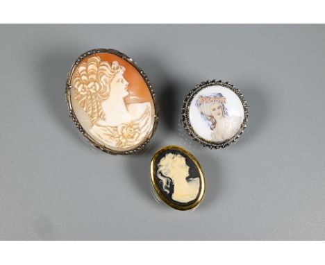 Three various brooches including modern oval cameo of female with marcasite mount, painted ceramic brooch and small cameo bro