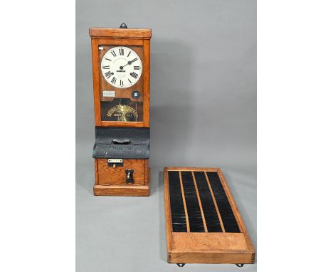 The National Time Recording Co. Ltd, a vintage oak cased time clock, with card slots and key, 98 cm h  