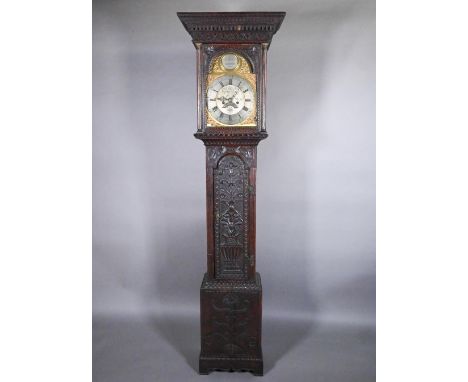 Jarvis, Dalton, an 18th century and later carved oak clock, the eight day movement with arched brass dial with silvered chapt