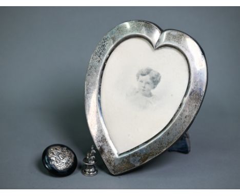 An Edwardian silver heart-shaped photograph frame , Birmingham 1906, 18cm high, to/w a desk seal surmounted by a rabbit, Will
