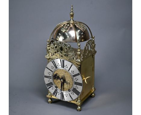 A late 19th century brass lantern clock, the 8-day two train movement signed AD Mougin, striking the hours and half hours on 