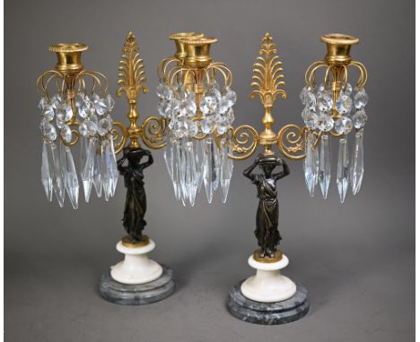 A fine pair of French Empire bronze, ormolu and marble crystal lustre drop two branch candelabra, 19th century, 34 cm h (2)  