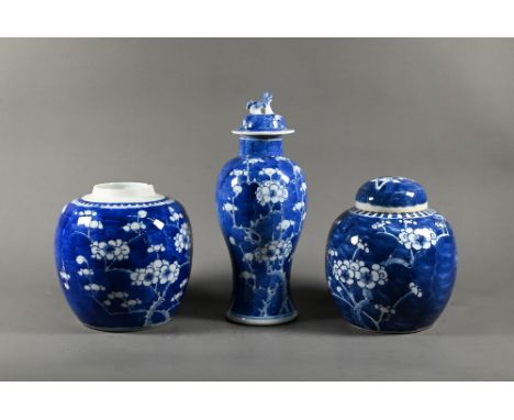 A Chinese blue and white porcelain ginger jar with continuous prunus on cracked ice pattern (missing cover) and pseudo four c