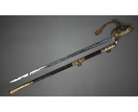 A Royal Navy officer's sword by Wilkingson of London, the badge etched with a crowned anchor, the solid gilt metal guard with