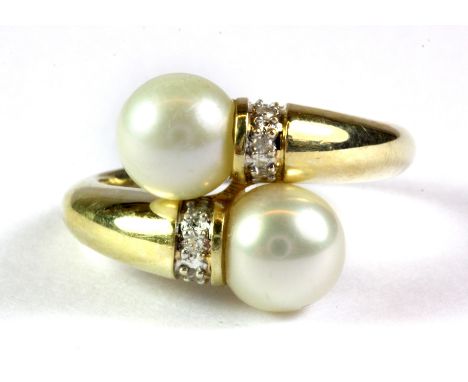 A 14ct yellow gold pearl and diamond set ring, (L).