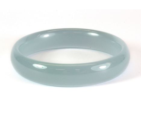 A polished lavender jade bangle, Dia. 6cm.