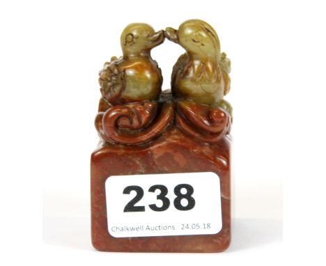 A Chinese carved soapstone seal of two mandarin ducks, H. 8cm.