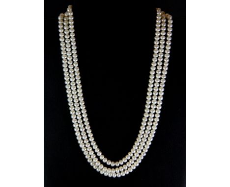 A three row cultured pearl necklace.