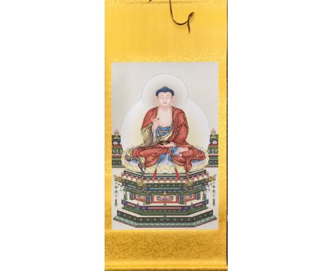 A Chinese silk mounted scroll of the seated Buddha, W. 67cm L. 151cm.