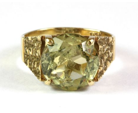 A 9ct yellow gold citrine set ring, (K).