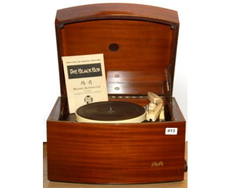 A mahogany cased Pye record player "The pipe black box", with instructions.