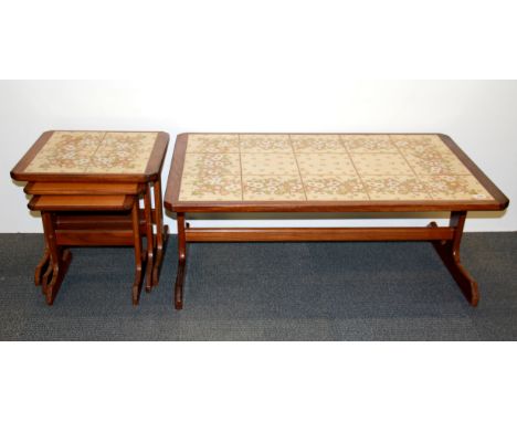 A 1970's G-plan tile topped coffee table, 110 x 66 x 44cm, and nest of three tables.