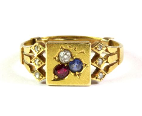 An antique 9ct yellow gold ring set with diamonds, sapphire and ruby, (N).