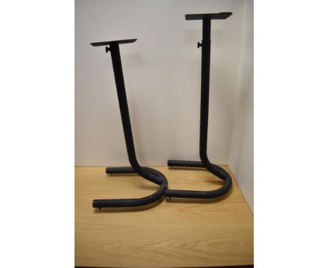 A pair of adjustable metal speaker stands, the U-form bases with adjustable points to underside