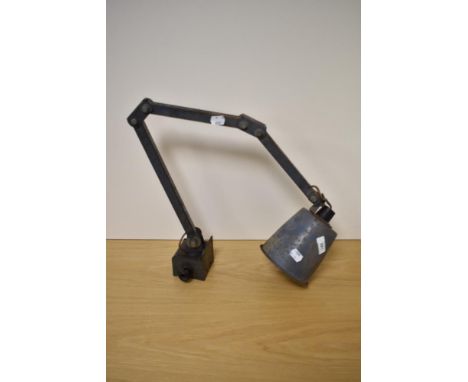 A mid century grey-painted steel industrial machinists angle-poise lamp, with conical shade, and four adjustment points, most