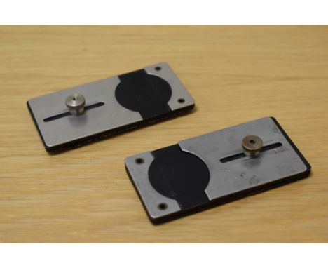 Two Swiss watch glass fitting tools