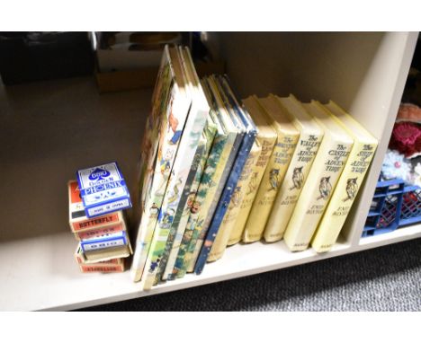 A group of eight vintage Rupert annuals, together with six Enid Blyton volumes