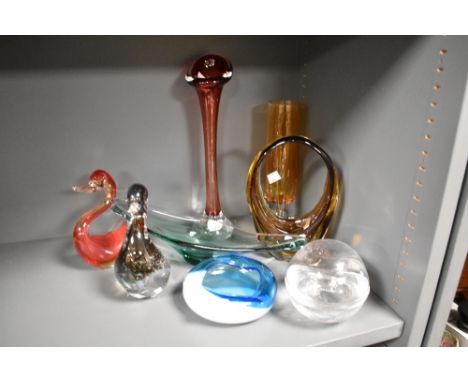 A collection of vintage art glass, including ducks and red and amber glass vases, blue bowl and Swedish Pukeberg glass lidded