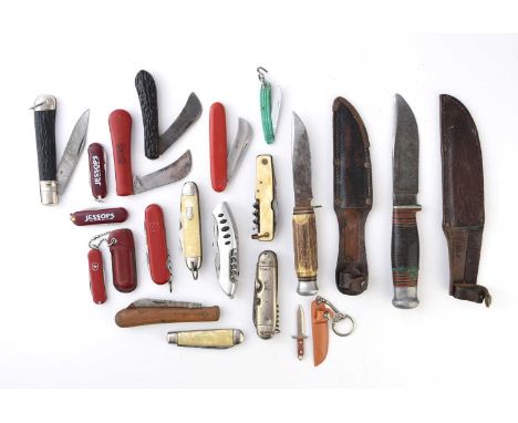 A collection of knives comprising a Wade and Butcher 'Boone' hunting knife in leather sheath, probably 1920s/30s, an Anton Wi