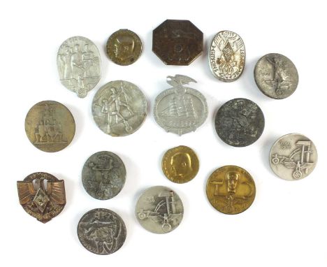 A group of sixteen assorted German Third Reich Gau Day badges and tinniesincluding Reichsparteitag 1930 and 1938; The Day of 