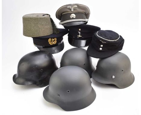 A mixed group of post-war headgear, comprising three hats in the German WW2 style - SS-style M43 Field cap, visor cap and a f