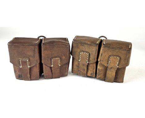 Two Mauser Rifle double ammunition pouches, stamped with German Third Reich eagles and marked 'Unibro. Bout. Leo.' Possibly B