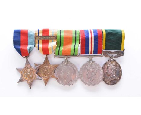 A Second World War medal group of 5 comprising 1939-45 Star, Africa Star with 8th Army clasp, Defence Medal, 1939-45 War Meda