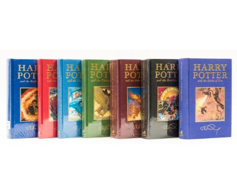 Ɵ ROWLING, J.K.  (b.1965 -).  [A Full Set of First Deluxe Edition Harry Potter Novels, one SIGNED by the Author]. Bloomsbury,