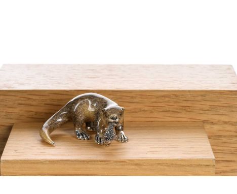 SILVER AND ENAMEL MINIATURE FIGURE, SATURNO modelled as a otter, with fish in mouth5cm longQty: 39g