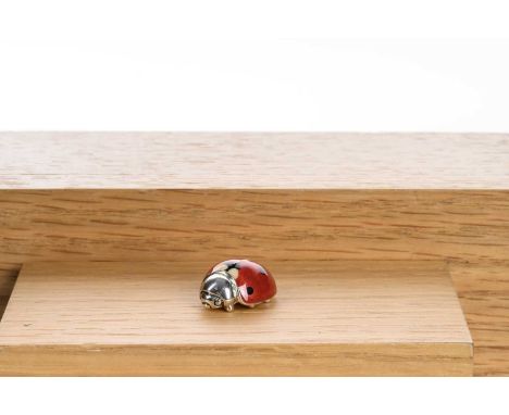 SILVER AND ENAMEL MINIATURE FIGURE, SATURNO modelled as a ladybird2.1cm longQty: 9g