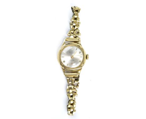 A ladies 9ct gold cased cocktail watch by Doric, 17 jewel manual wind movement, on gilt metal strap.