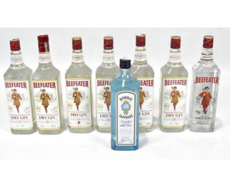 Seven bottles of Beefeater gin, together with another bottle of gin
