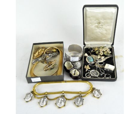 A quantity of silver, white metal and costume jewellery including a yellow metal three stone diamond ring, a novelty 19th Cen