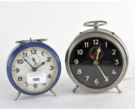 A Hamburg American clock with Goliath repeater and a smaller alarm clock
