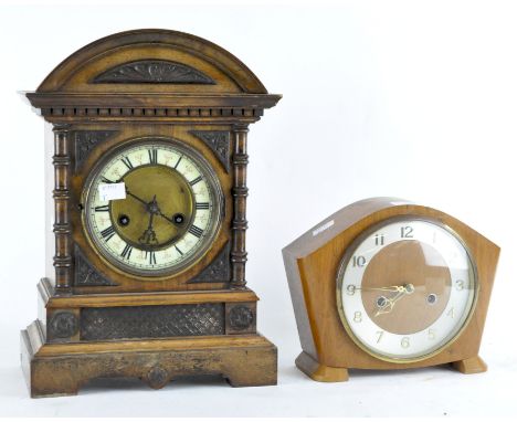An early 20th century mahogany cased mantle clock by the Hamburg American Clock co, made in Wurttemburg, no 1077, together wi