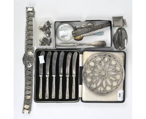 A selection of silver and white metal wares, to include a silver handled magnifying glass, continental 900 grade silver gilt 