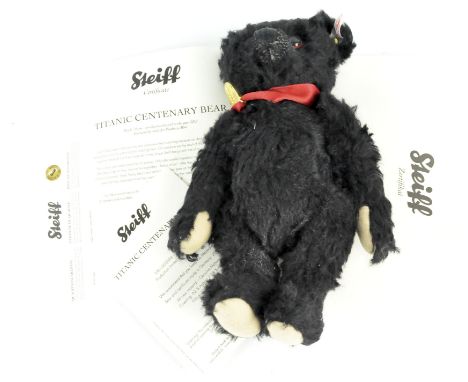 A limited edition black mohair Steiff 'Titanic Centenary' bear, no. 604, length 25cm, with certificate