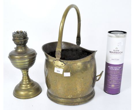 A vintage brass lamp and coal scuttle, height circa 25cm