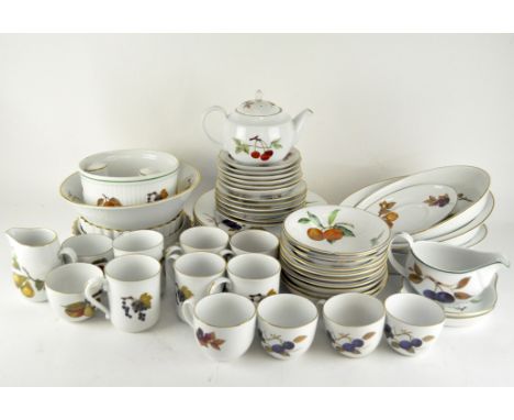 A selection of Royal Worcester Evesham ceramics, including cups and saucers, plates, a teapot, salt and pepper shakers and a 