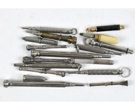 A collection of propelling pencils, most having engine turned decoration to the shafts, some with gem set ends.