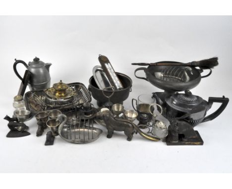 A collection of silver plate and other metalware, including teapot, novelty dog nutcracker, hammered pewter twin handled dish