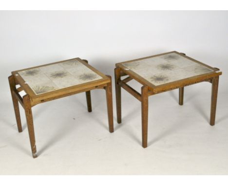 A pair of Retro tile topped teak occasional tables, on pegged tapering supports, 46cm x 61cm x 54cm
