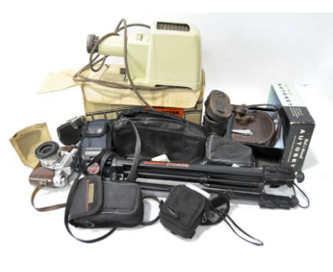 A collection of cameras, lenses and accessories, including a Bessamatic Voigtlander in a leather case, a Kodaslide projector,