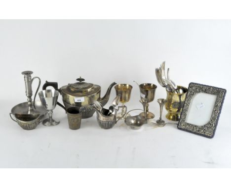 A quantity of vintage silver plate, including a tea set, a small pair of silver spill vases, goblets, flatware and more