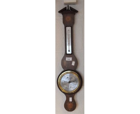A mid century Short &amp; Mason wall barometer, the mahogany vaneer with inlaid shell motifs, 71cm high.