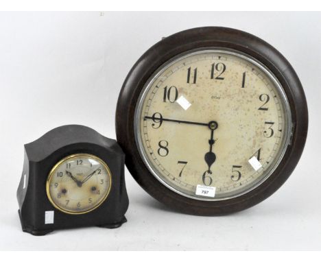 A Smith Enfield London circular wall clock, the cream dial with Arabic numerals, within a dark wooden frame, diameter 40cm, t