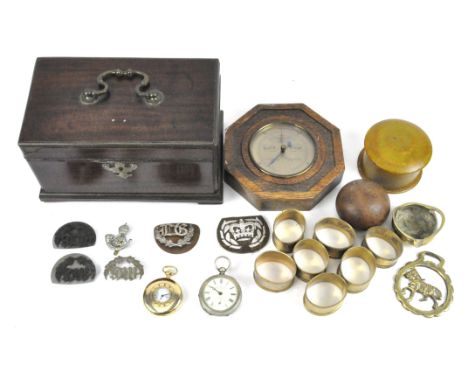 Assorted collectables, including a tea caddy, barometer, napkin rings, two pocket watches, and more